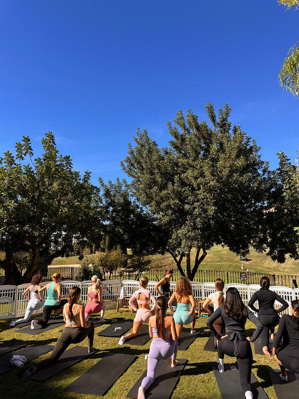 Puppy yoga class at Anantara Villa Padierna Palace, Marbella — outdoor Andalusian gardens